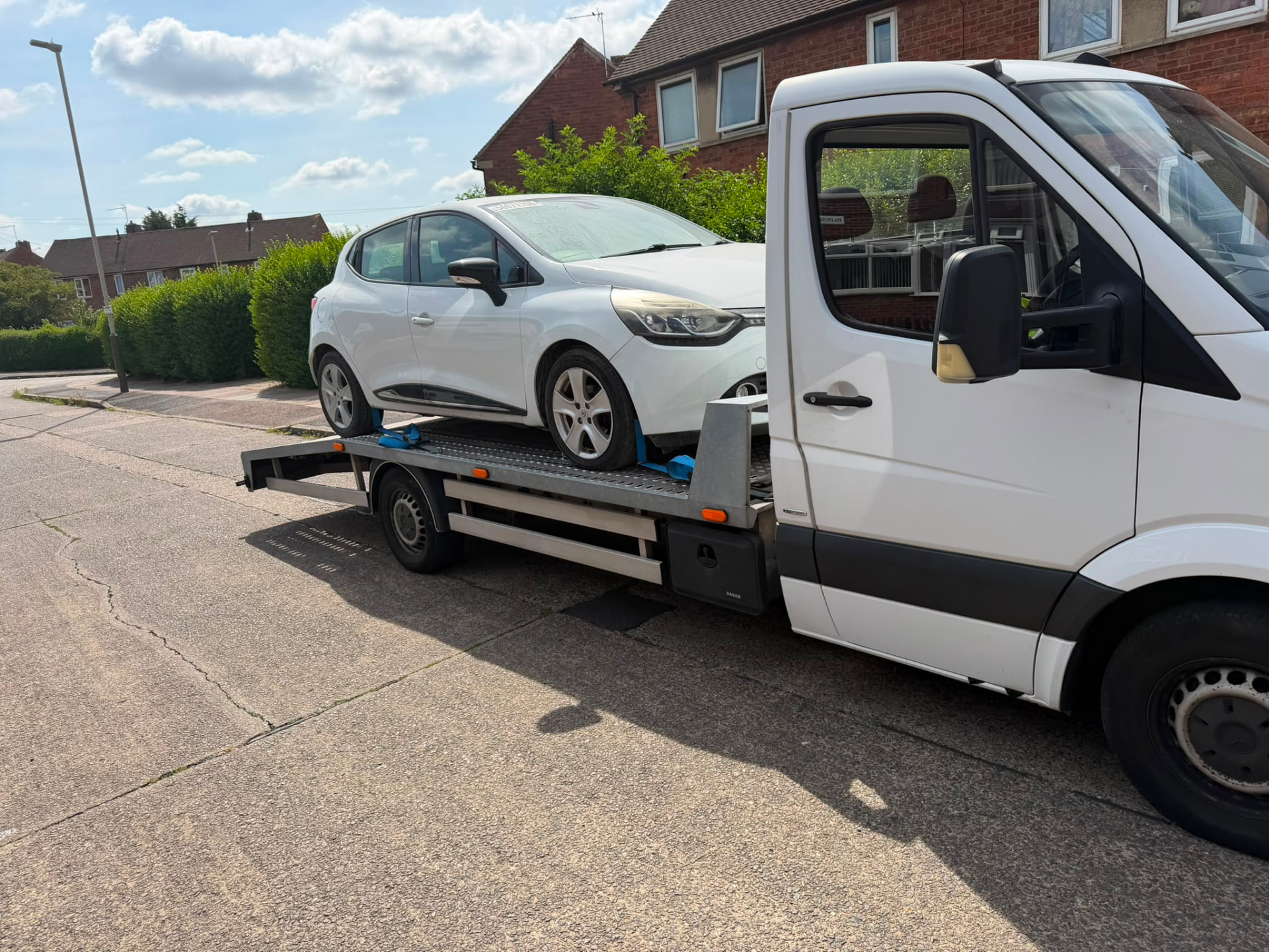Renault Clio being transported from Copart Wolverhampton to Leicester by vehicle recovery truck