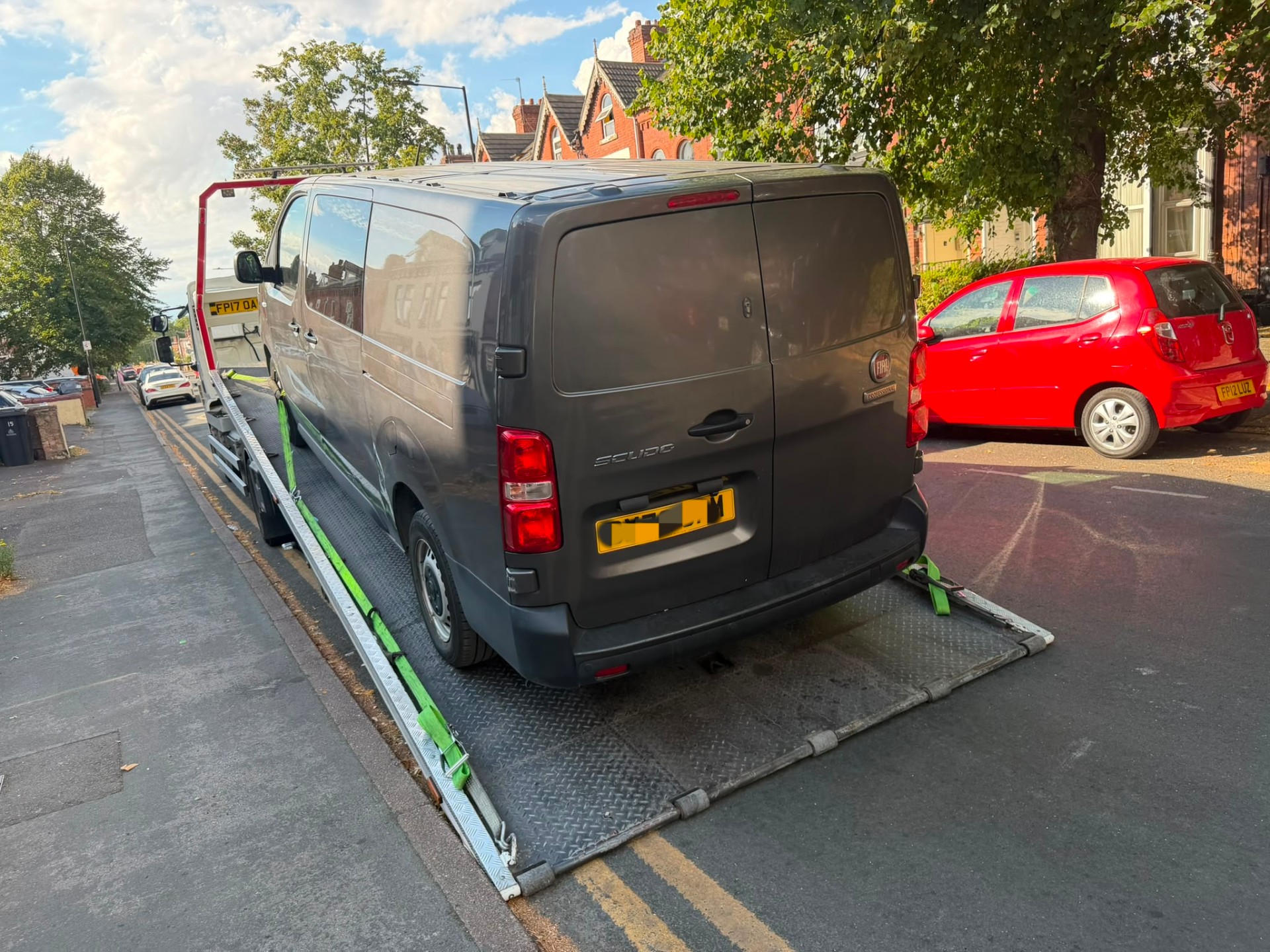 Long-wheelbase Fiat Scudo van loaded onto a UTEO recovery truck for transport from Doncaster to Bedworth