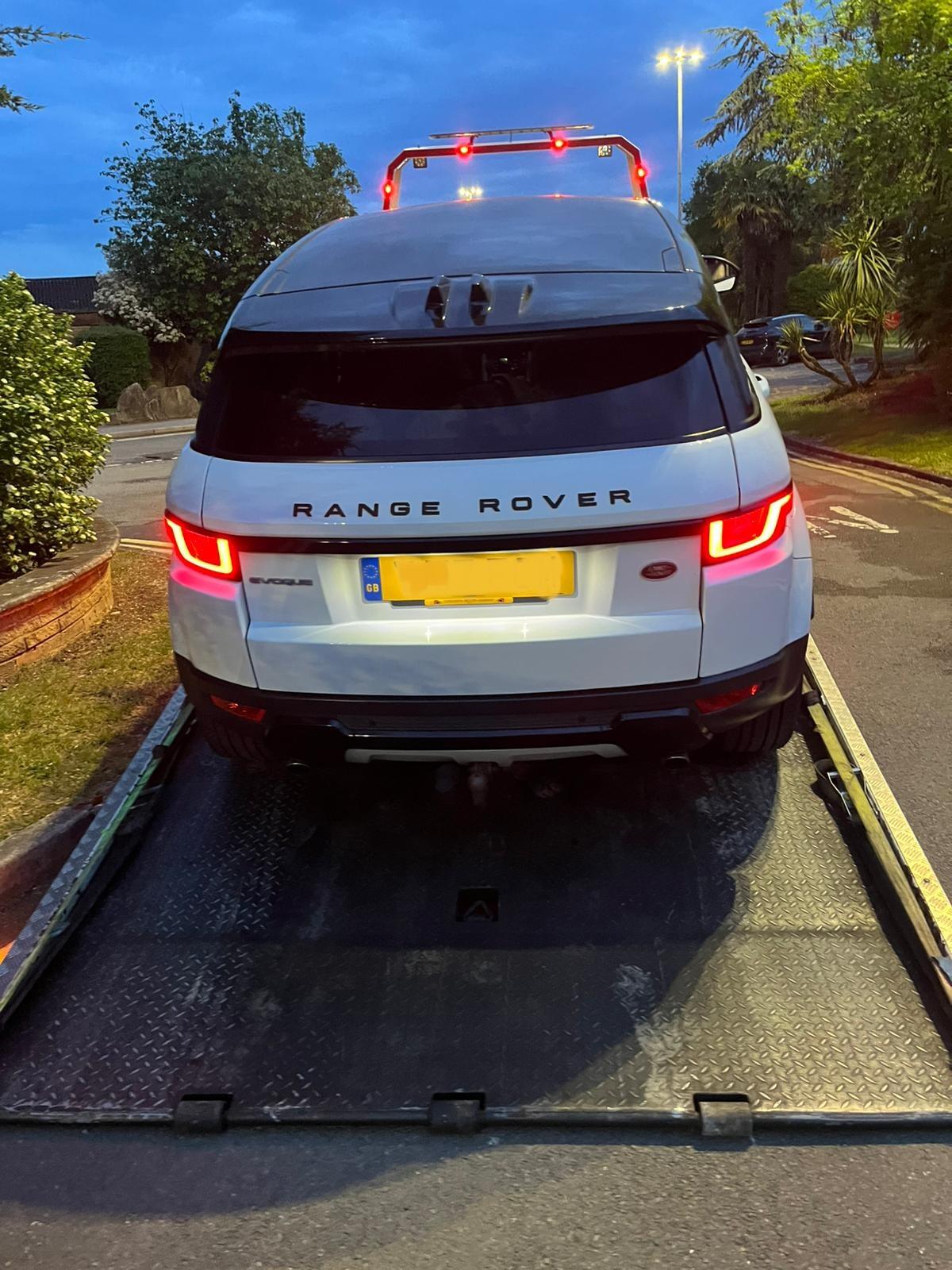 Range Rover Evoque loaded onto a UTEO recovery transporter near the M69 at Hinckley